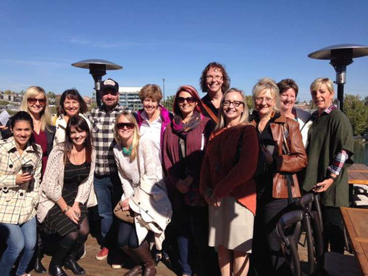 Charbar Co-Chef and Co-Owner John Jackson poses with TMAC AB & NWT members & guests on Simmons Building rooftop (Photo Credit: Jody Robbins)