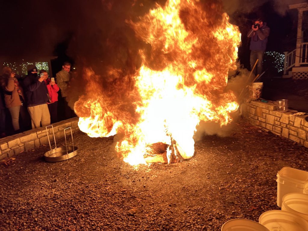 diners_photograph_the_boilover_during_a_traditional_fish_boil_at_white_gull_inn_credit_jennifer_bain